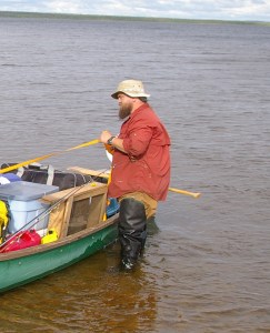 Dr. Neilsen loading a canoe at Ashuanipi Lake. (Todd Kristensen)